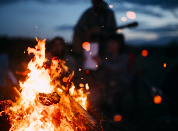 Bonfire with sparks flying around - stock photo