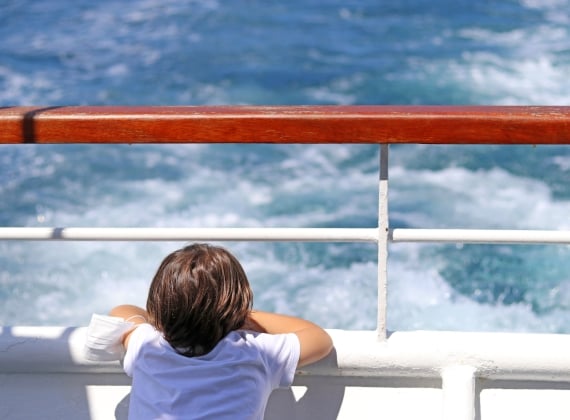 Child riding ferry