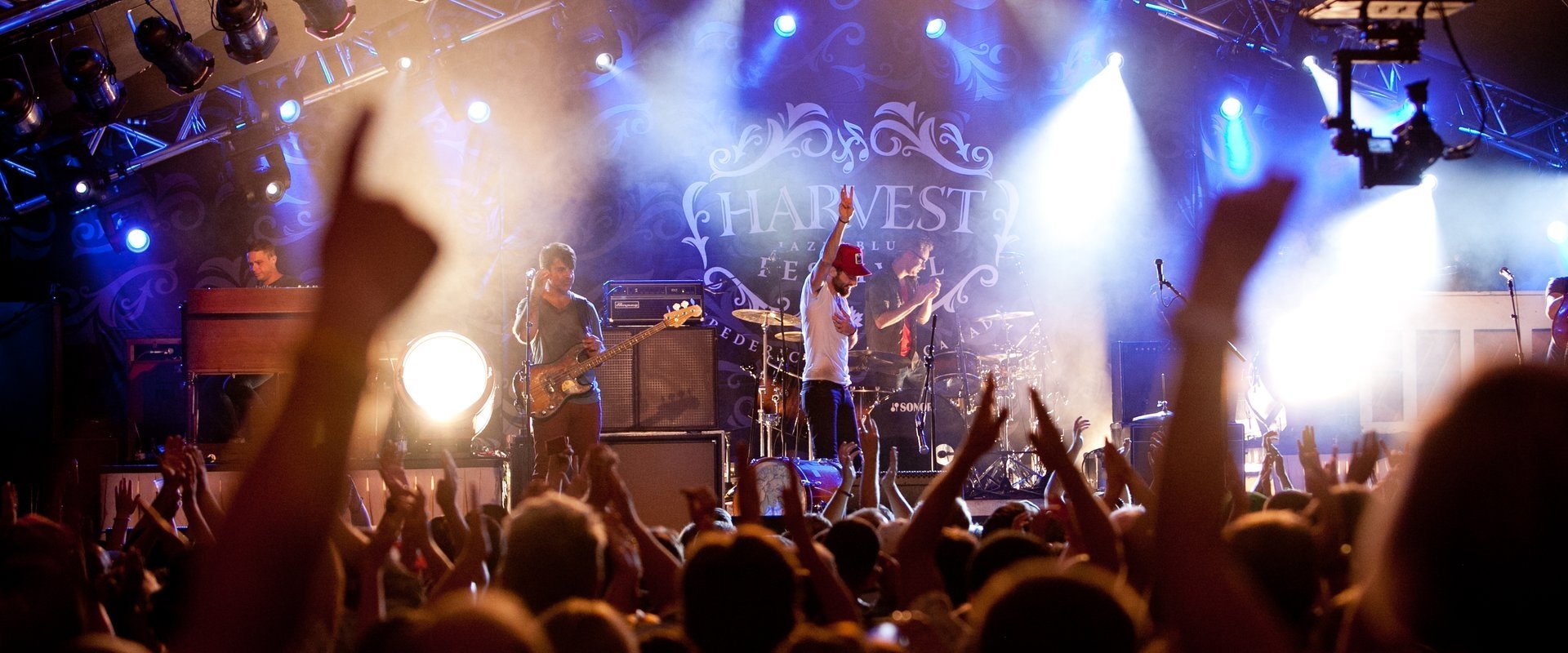 A rock concert on a stage under bright lights